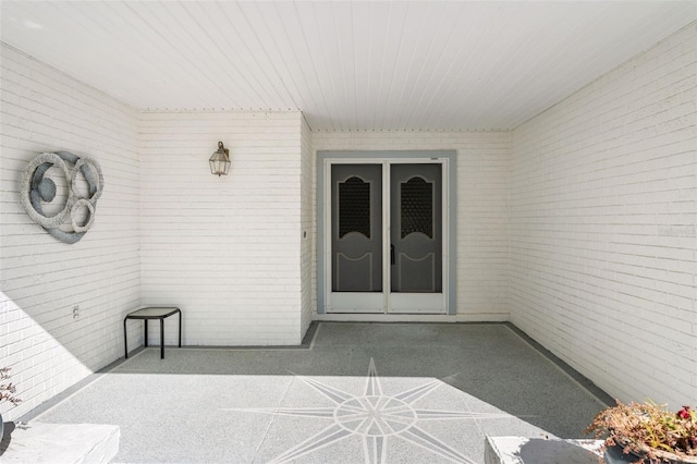 doorway to property with a patio