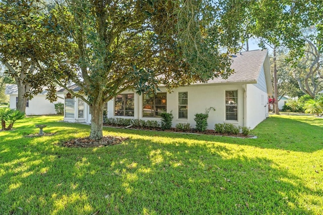 view of front of house with a front lawn