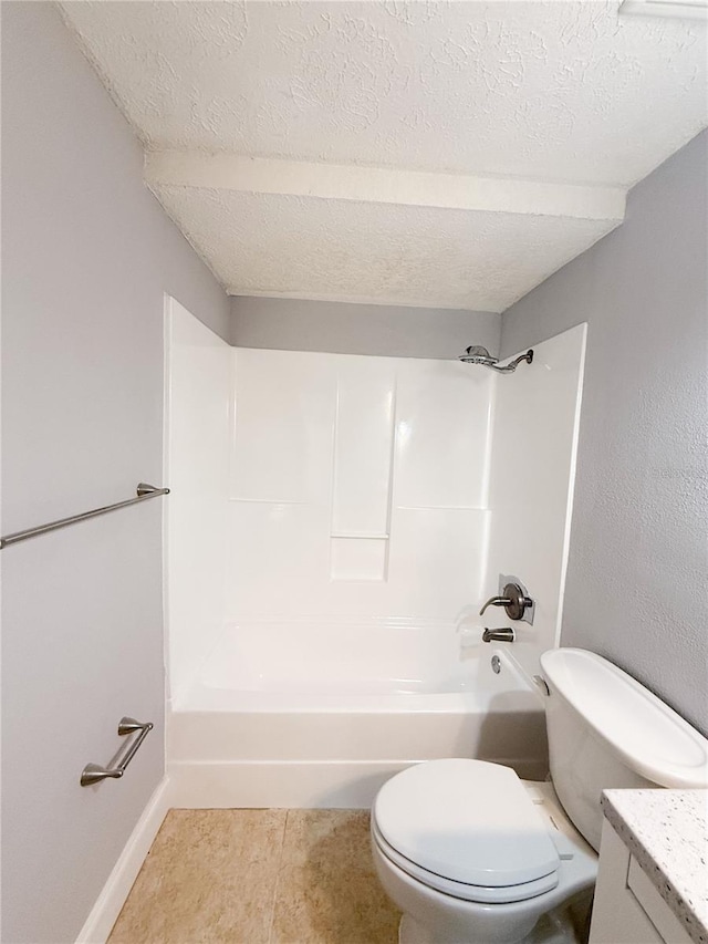 full bathroom featuring vanity, a textured ceiling,  shower combination, tile patterned flooring, and toilet