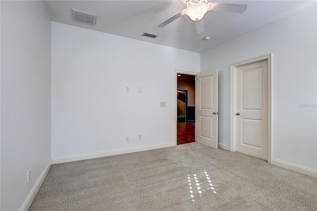 unfurnished bedroom featuring ceiling fan and carpet floors