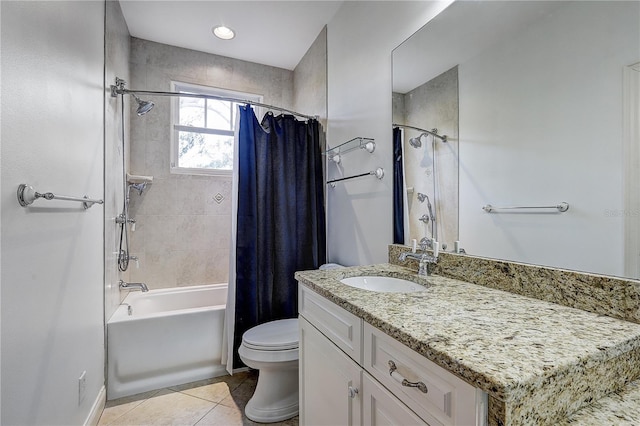 full bathroom featuring shower / bath combination with curtain, tile patterned flooring, vanity, and toilet