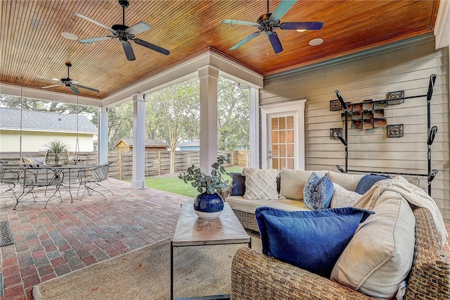 view of patio featuring ceiling fan and outdoor lounge area