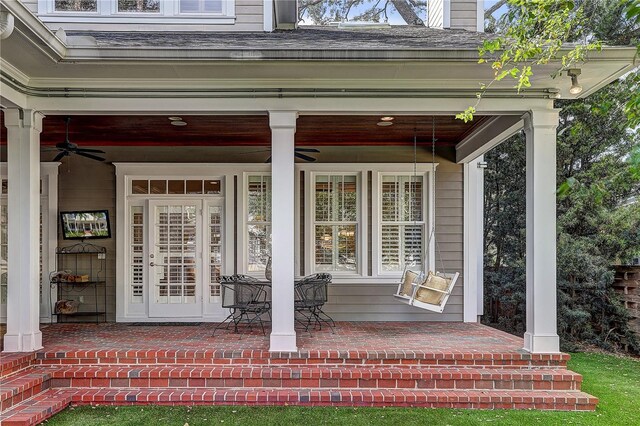 view of exterior entry featuring a porch