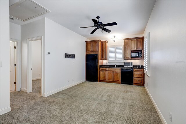 kitchen with ceiling fan, light carpet, and black appliances