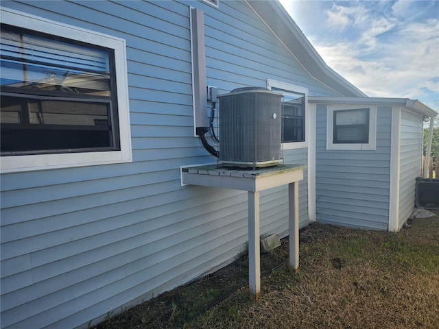 view of property exterior with central air condition unit