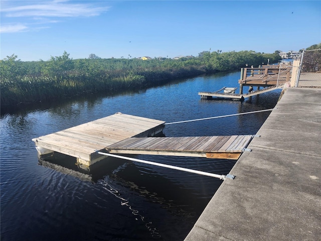 view of dock featuring a water view