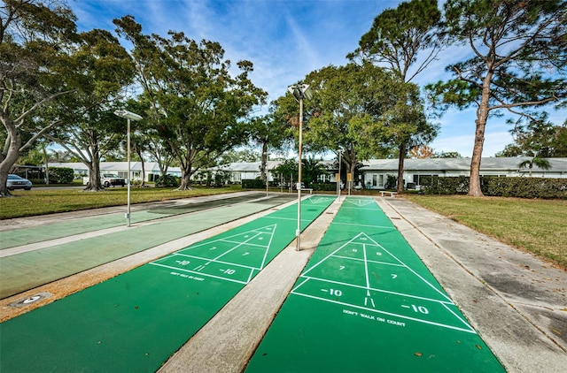 view of home's community featuring a yard