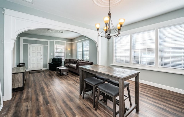 dining area featuring dark hardwood / wood-style floors