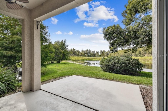 view of patio / terrace with a water view