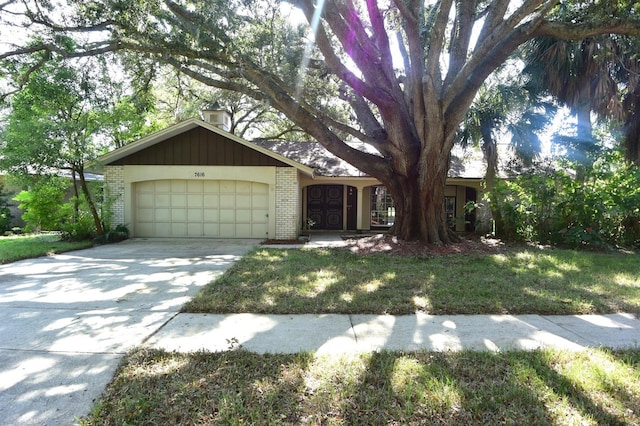 ranch-style home with a garage