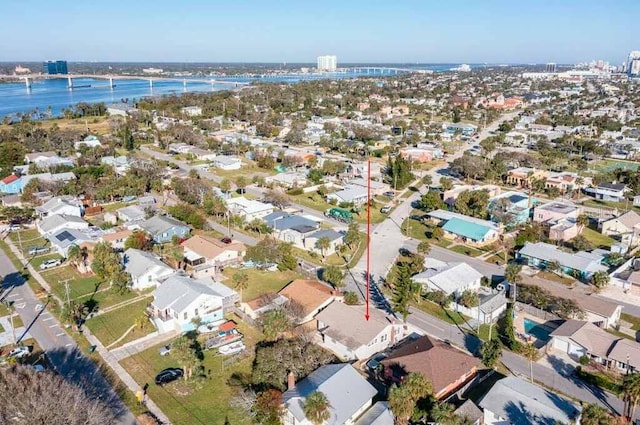 drone / aerial view with a water view