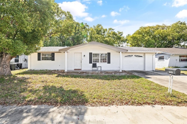 7240 Nova Scotia Dr, Port Richey, FL 34668 - ranch-style house with driveway, a shingled roof, a garage, and a front yard