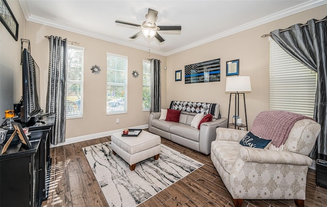 living room featuring ornamental molding, dark wood-type flooring, and ceiling fan