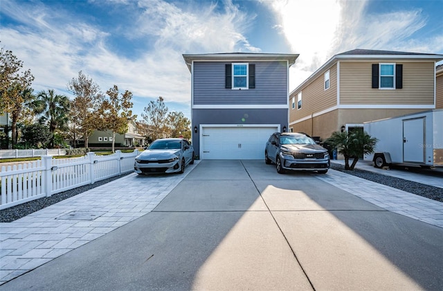 view of side of home with a garage