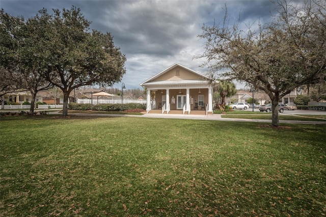 view of home's community with a lawn