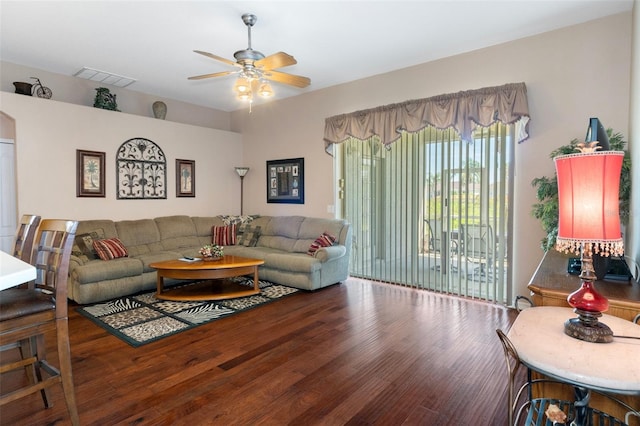 living room with ceiling fan and hardwood / wood-style floors