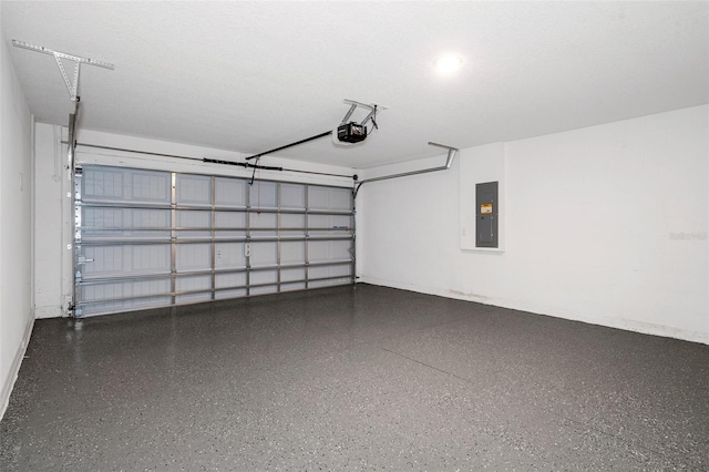 garage with electric panel and a garage door opener