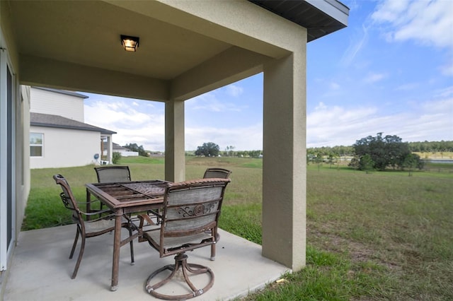 view of patio with a rural view