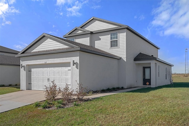 front of property featuring a front yard and a garage