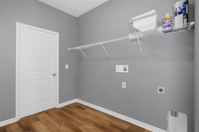 washroom featuring hardwood / wood-style floors, hookup for a washing machine, and electric dryer hookup