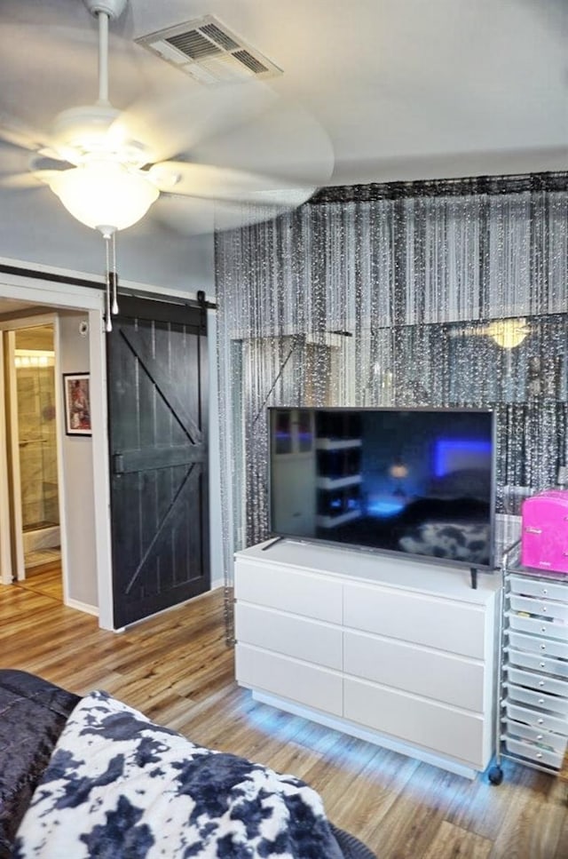 interior space featuring visible vents and wood finished floors