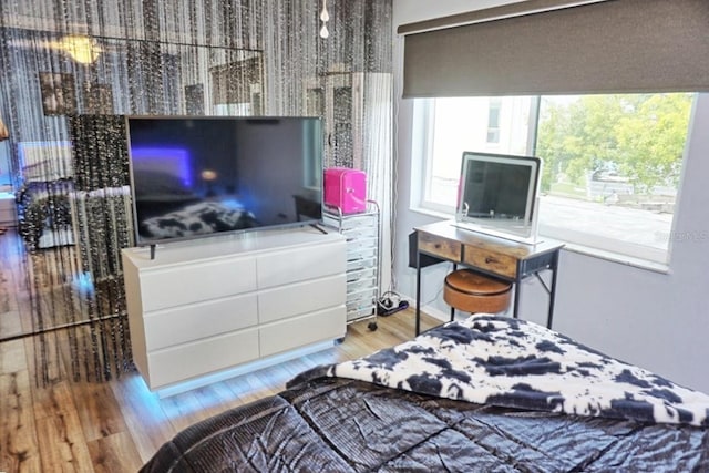 bedroom featuring light wood-type flooring