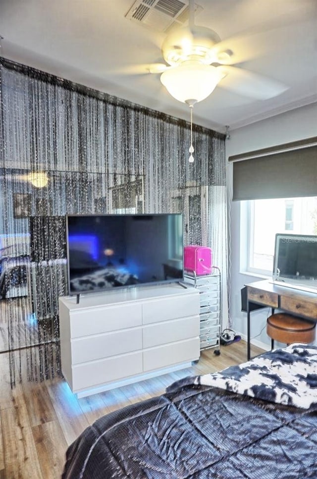 bedroom featuring wood-type flooring