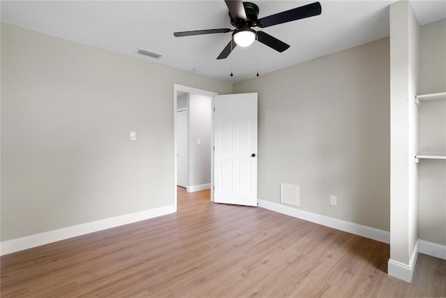 unfurnished bedroom featuring ceiling fan and light hardwood / wood-style floors