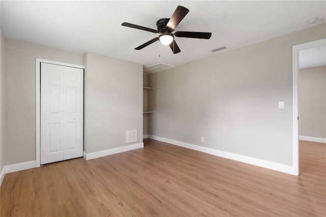 unfurnished bedroom featuring a closet, ceiling fan, and light hardwood / wood-style floors