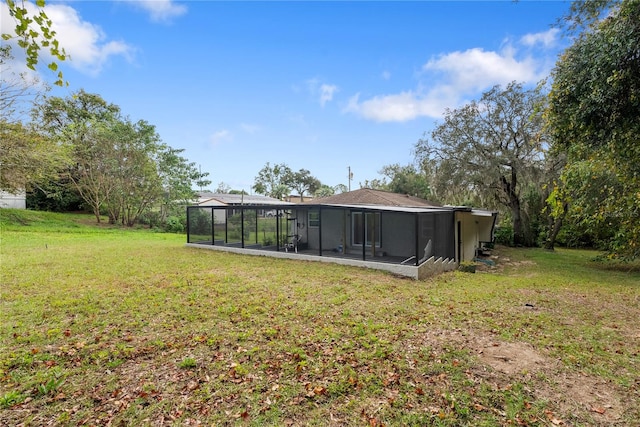 view of yard featuring a sunroom