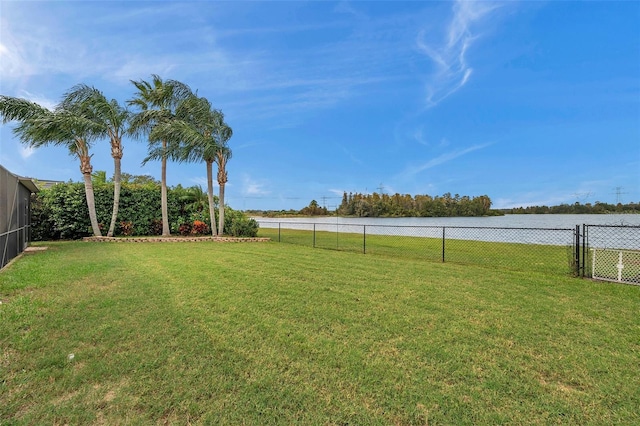 view of yard with a water view