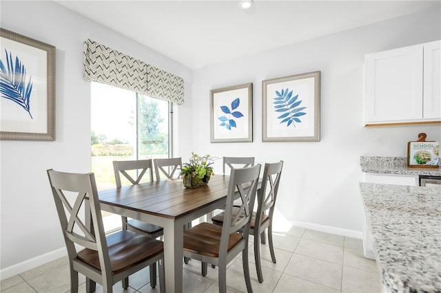 dining room with light tile patterned floors