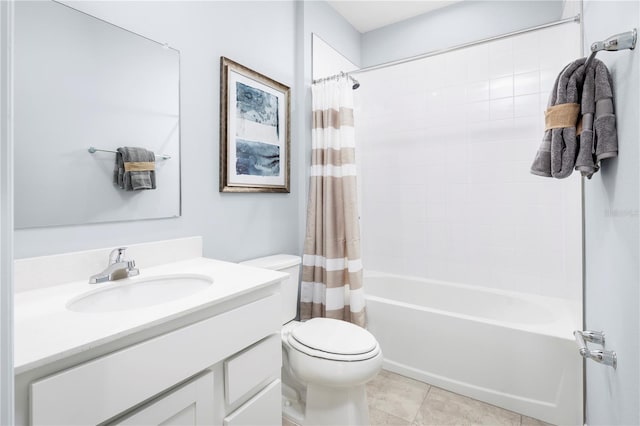 full bathroom featuring vanity, toilet, tile patterned floors, and shower / bath combo