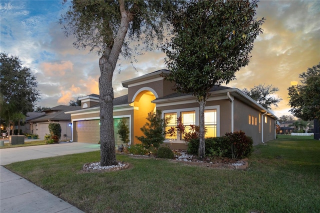 view of front of home featuring a lawn