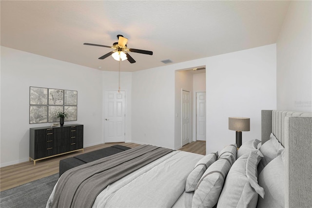 bedroom featuring ceiling fan and hardwood / wood-style flooring