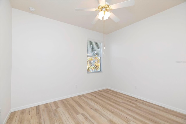 spare room with light hardwood / wood-style floors and ceiling fan