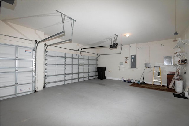 garage featuring a garage door opener and electric panel