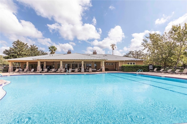 view of pool featuring a patio area