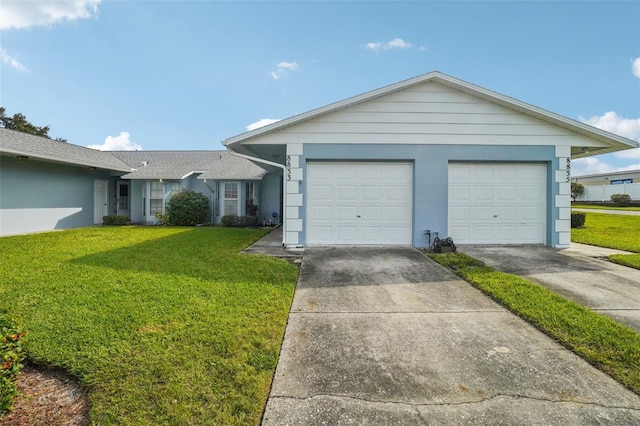 single story home featuring a garage, stucco siding, concrete driveway, and a front lawn