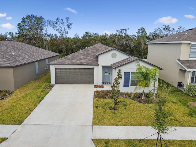 single story home with a garage and a front yard