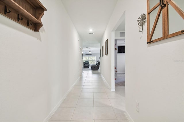 hallway with light tile patterned flooring