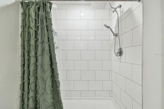 bathroom featuring curtained shower