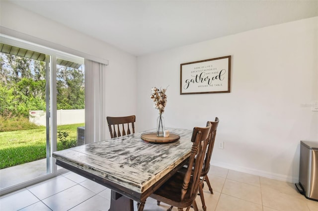 view of tiled dining space