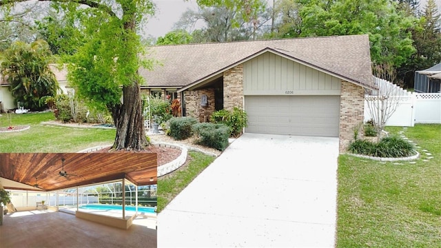 view of front of property featuring brick siding, an attached garage, and a front yard