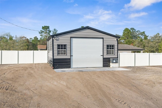 view of outbuilding featuring a garage