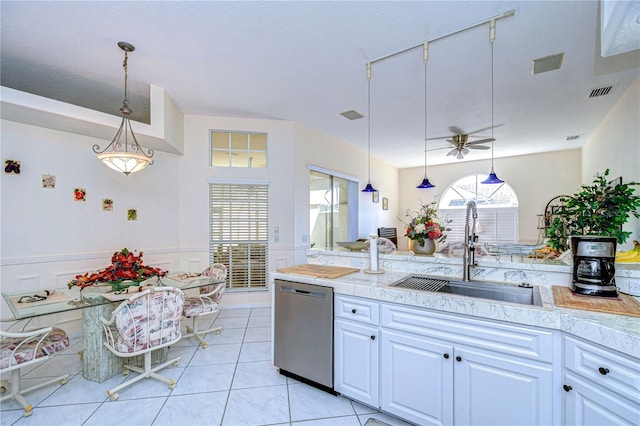 kitchen with dishwasher, hanging light fixtures, sink, white cabinetry, and ceiling fan