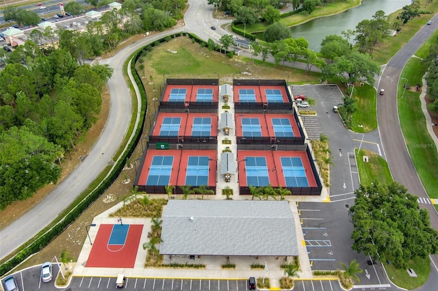 birds eye view of property featuring a water view