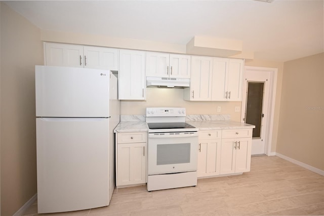 kitchen featuring white appliances and white cabinets