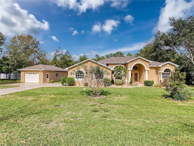 ranch-style house featuring a garage and a front yard