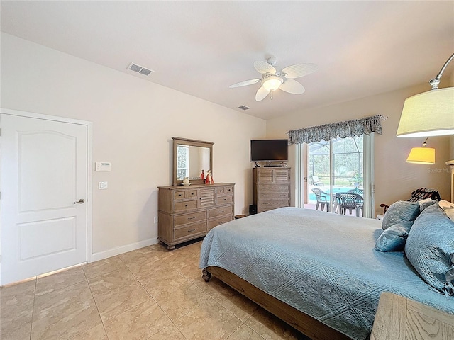 tiled bedroom with ceiling fan and access to exterior